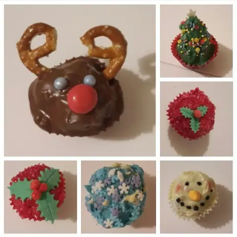 Assortiment de cupcakes de Noël : renne au chocolat, sapin, houx, flocons et bonhomme de neige